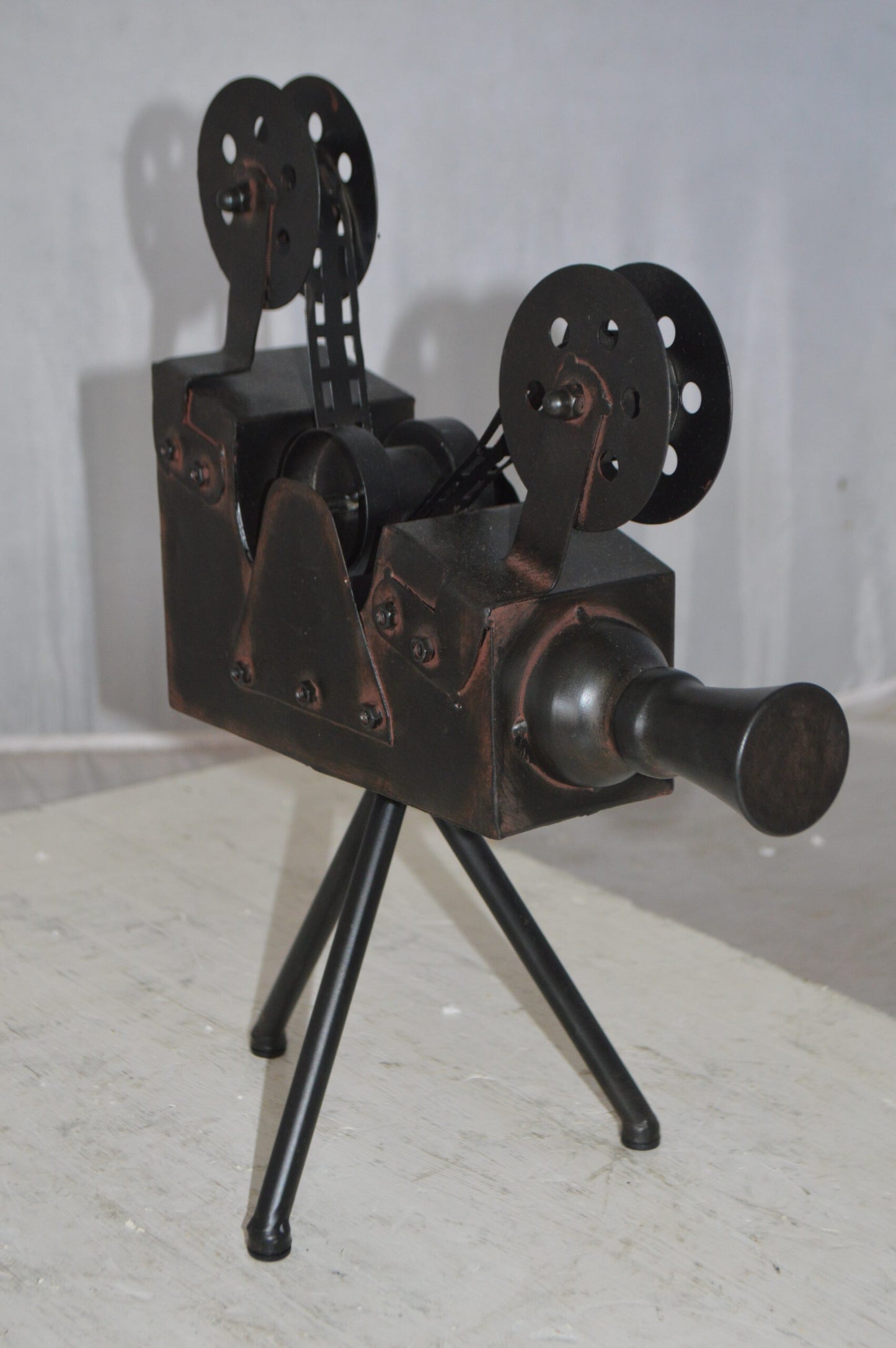 Movie Reel Abstract Metal Statue on tripod -  Size: 12"L x 6"W x 15"H.