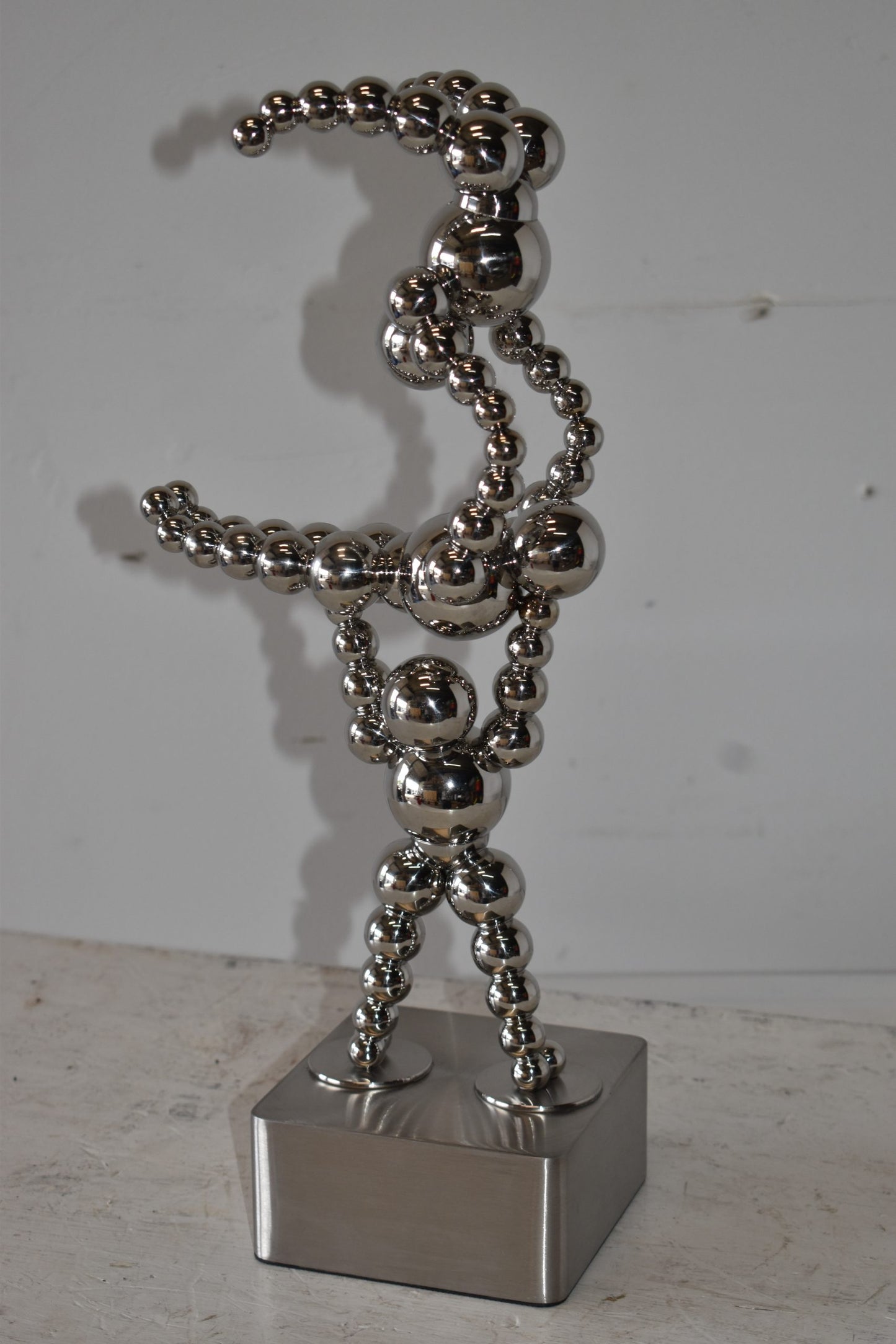 Modern Art of Acrobat Couple in Action Chrome Balls Statue Size: 6" x 8" x 18"H