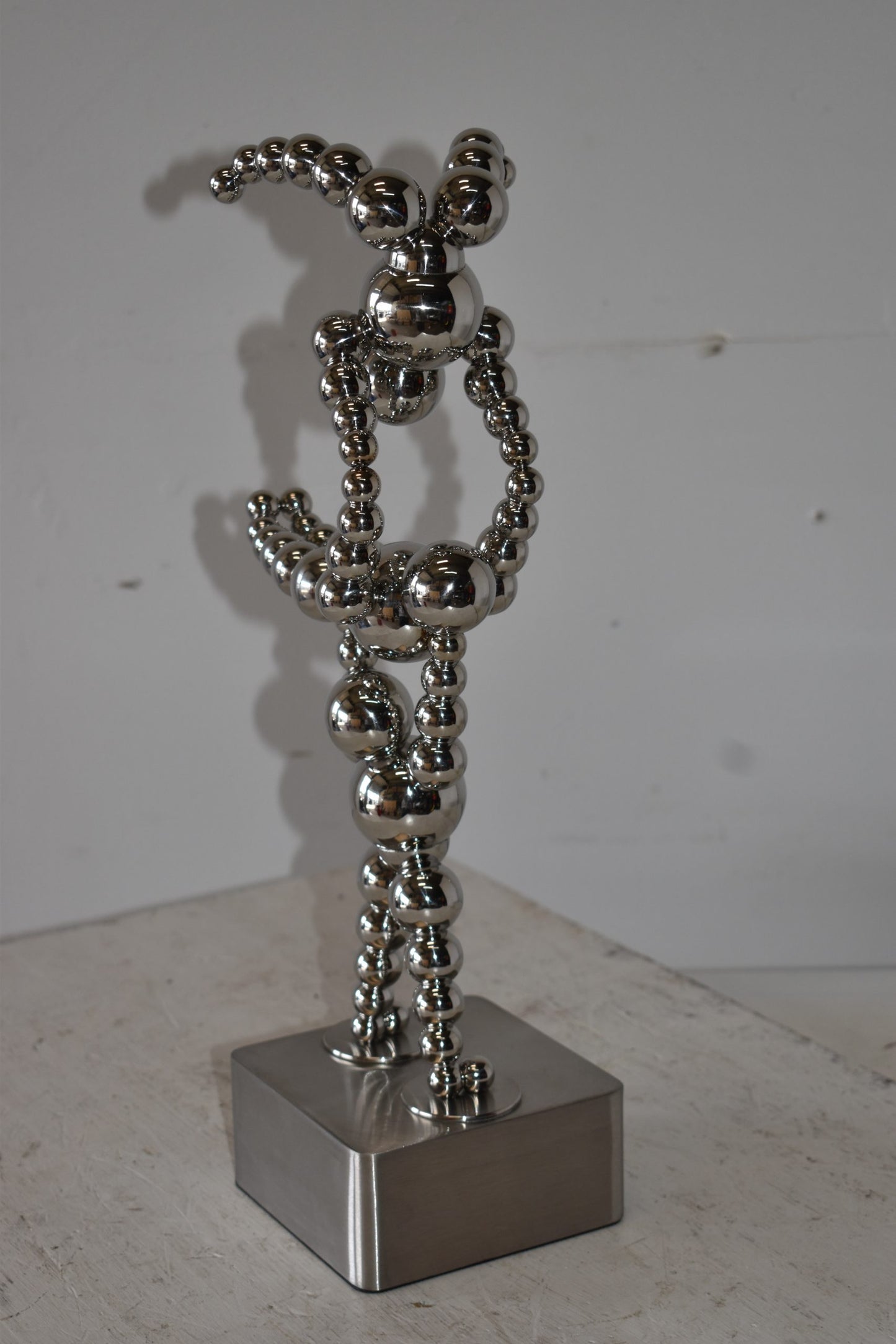 Modern Art of Acrobat Couple in Action Chrome Balls Statue Size: 6" x 8" x 18"H