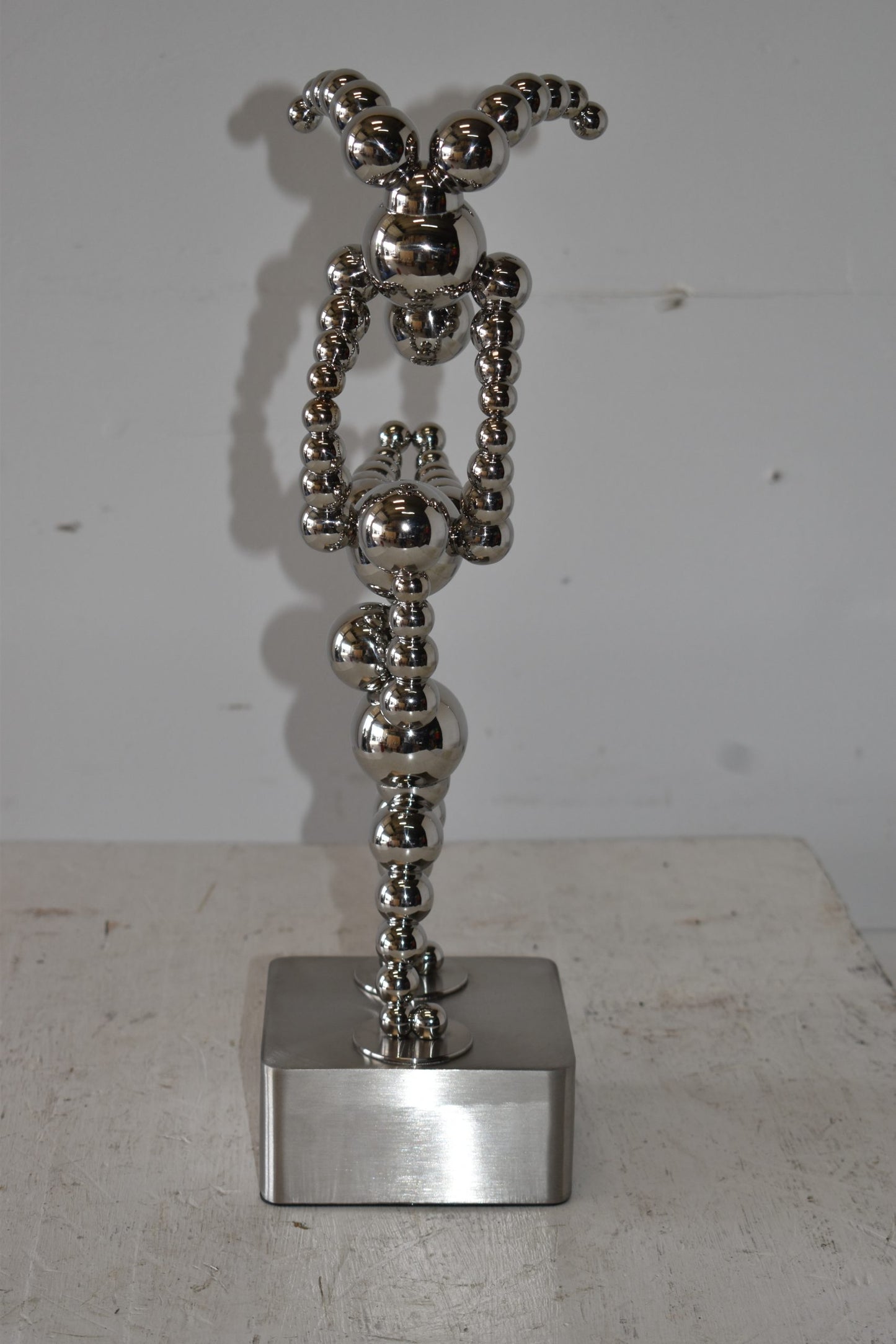 Modern Art of Acrobat Couple in Action Chrome Balls Statue Size: 6" x 8" x 18"H