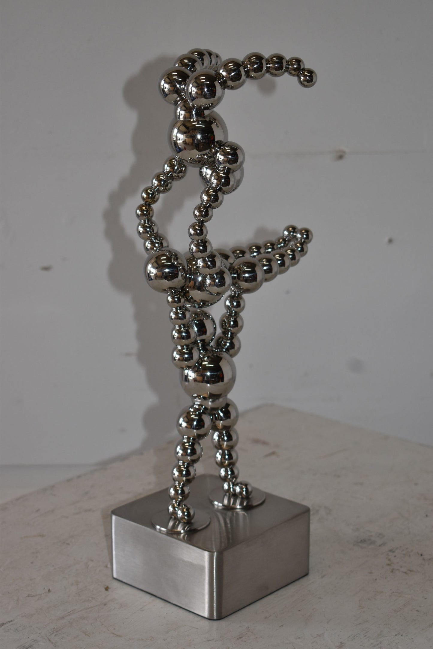 Modern Art of Acrobat Couple in Action Chrome Balls Statue Size: 6" x 8" x 18"H