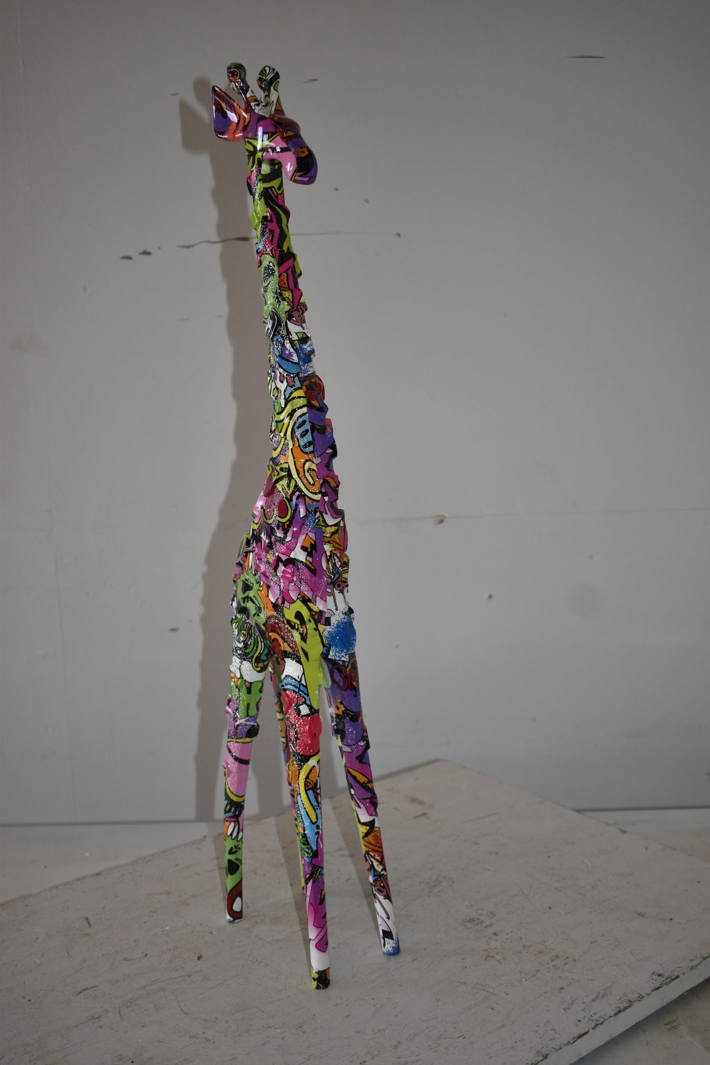 Modern Graffiti Giraffe Statue Made of Resin Size: 4" x 6" x 30"H