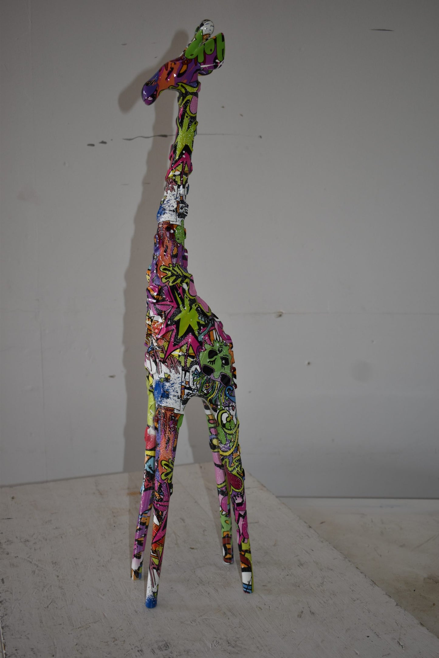 Modern Graffiti Giraffe Statue Made of Resin Size: 4" x 6" x 30"H