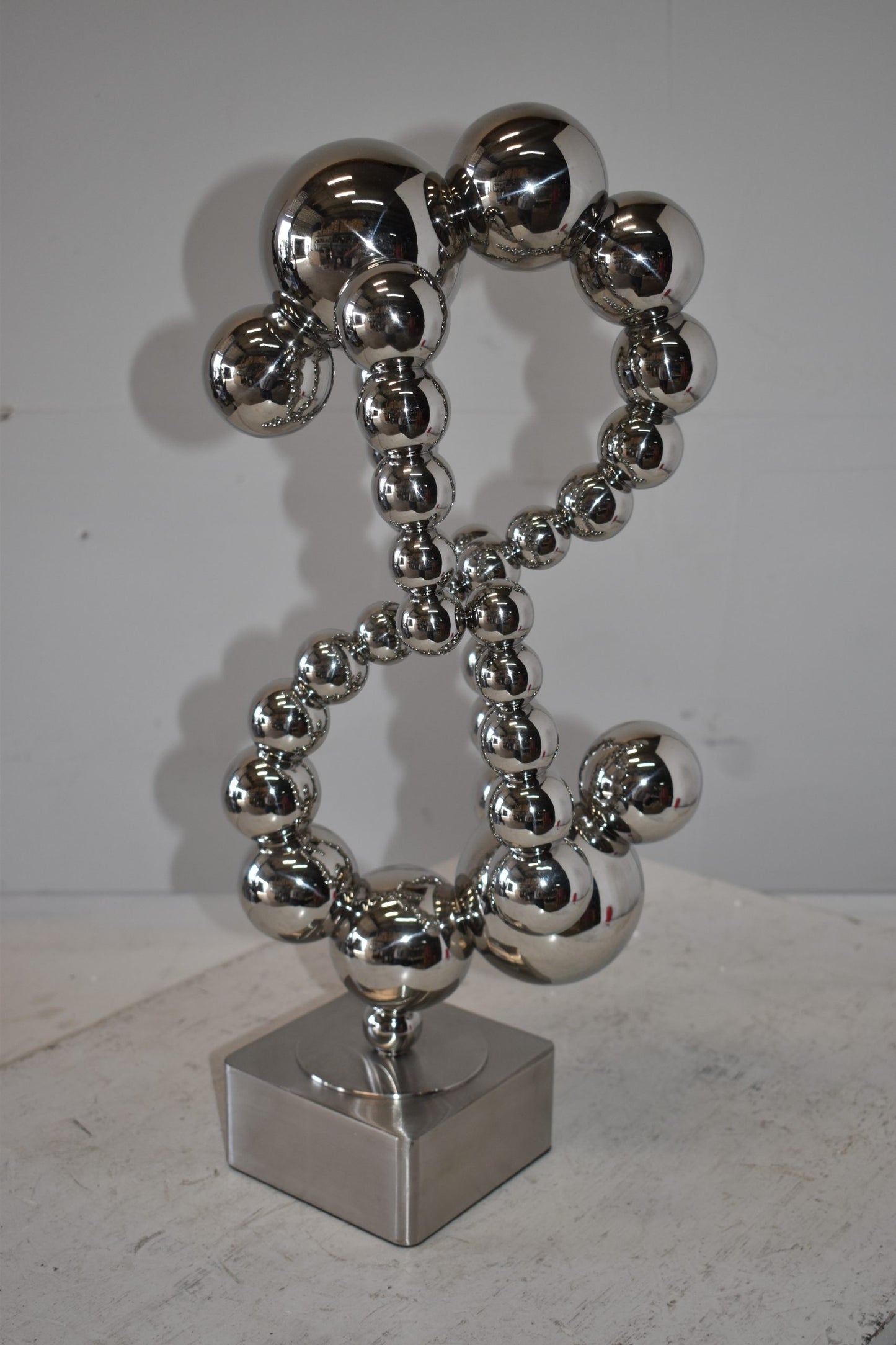 Modern Art of Acrobats in Action Made of Chrome Balls Size: 12" x 8" x 23"H