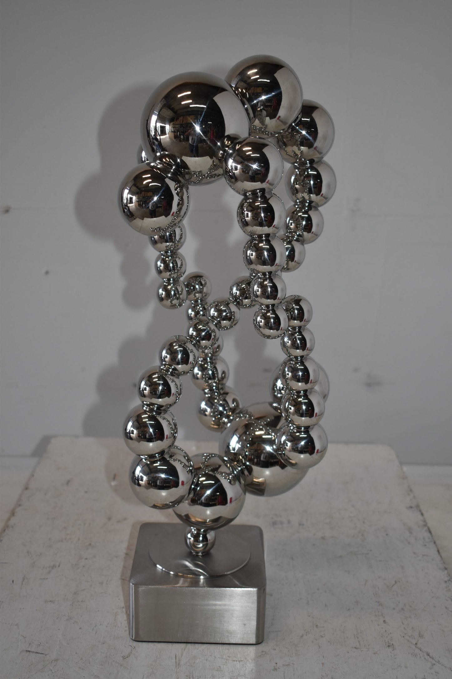 Modern Art of Acrobats in Action Made of Chrome Balls Size: 12" x 8" x 23"H