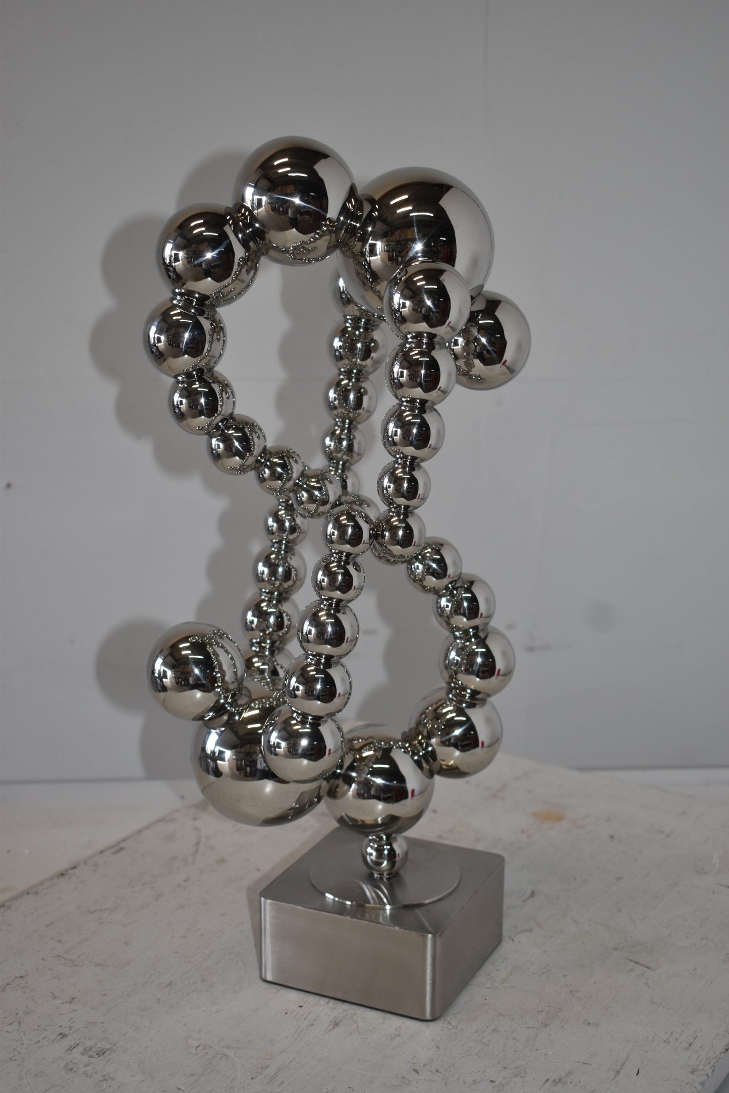 Modern Art of Acrobats in Action Made of Chrome Balls Size: 12" x 8" x 23"H
