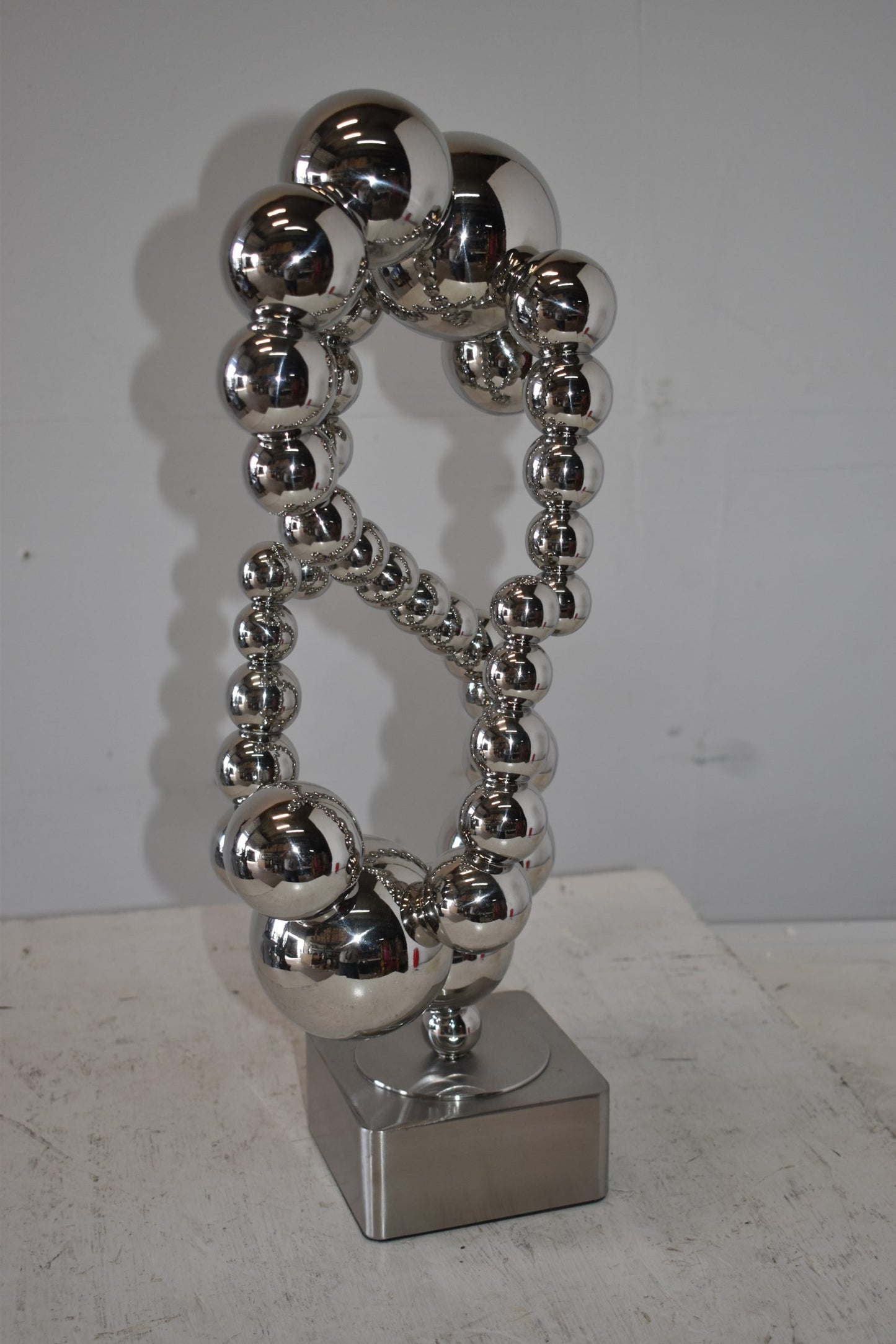 Modern Art of Acrobats in Action Made of Chrome Balls Size: 12" x 8" x 23"H