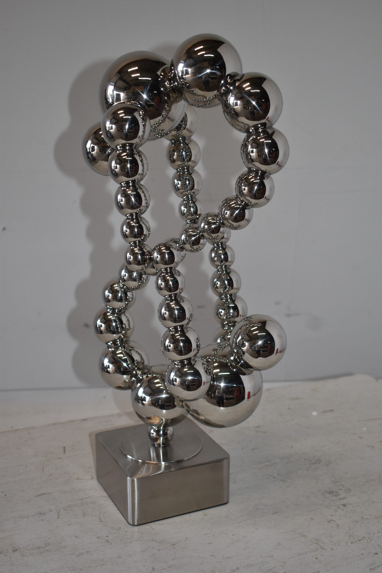 Modern Art of Acrobats in Action Made of Chrome Balls Size: 12" x 8" x 23"H