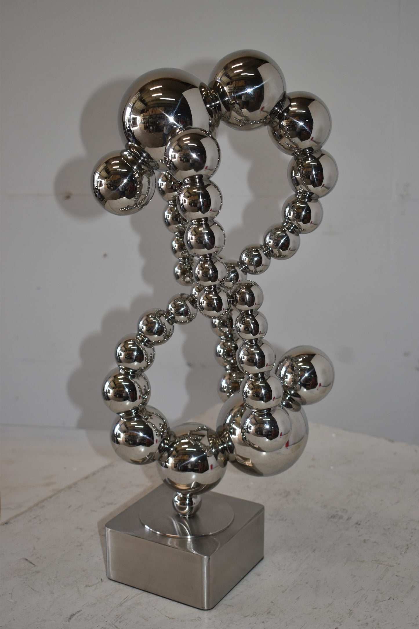 Modern Art of Acrobats in Action Made of Chrome Balls Size: 12" x 8" x 23"H