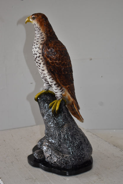 Eagle Standing on a Rock Looking for Prey Size: 10" x 13" x 22"H