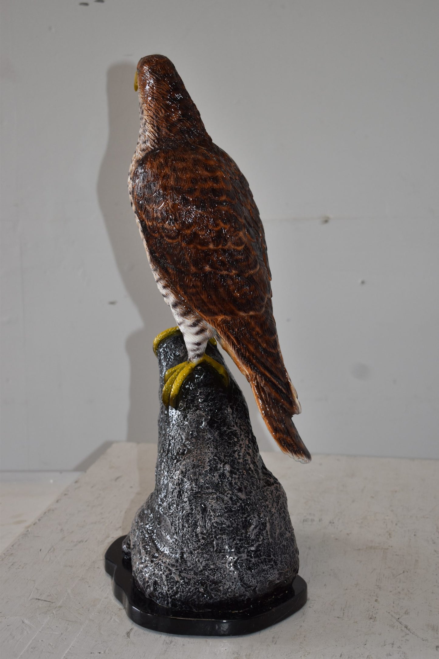 Eagle Standing on a Rock Looking for Prey Size: 10" x 13" x 22"H