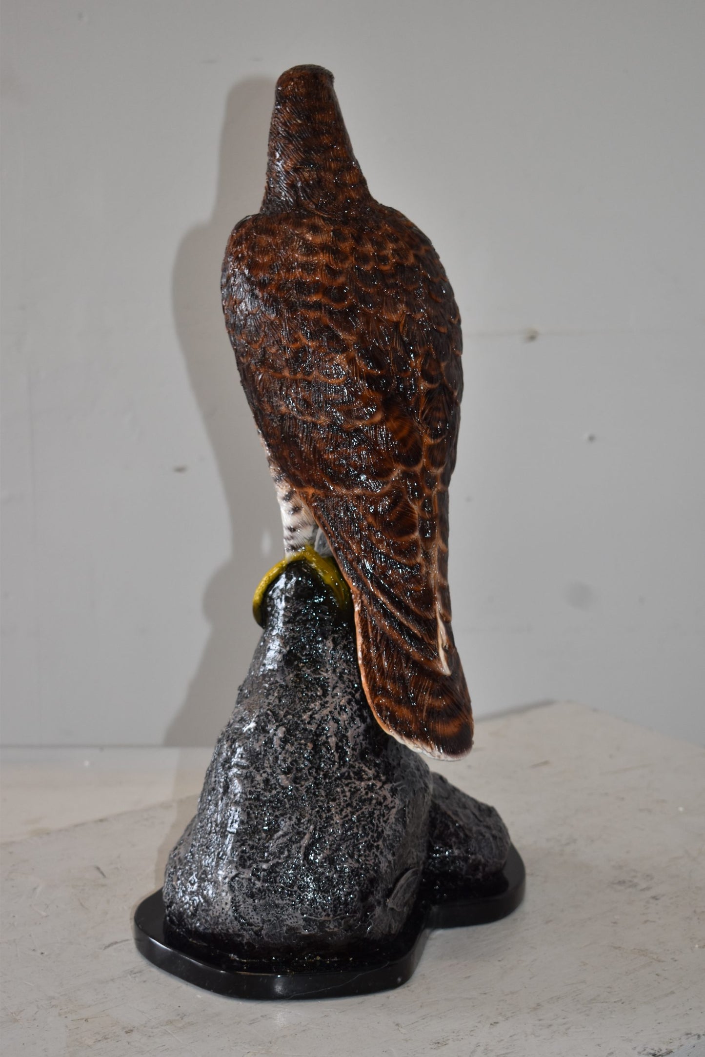 Eagle Standing on a Rock Looking for Prey Size: 10" x 13" x 22"H