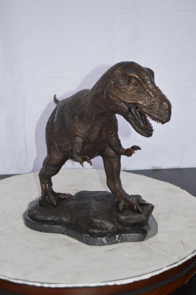 Tyrannosaurus Rex Dinosaur Bronze Statue -  Size: 31"L x 12"W x 15"H.