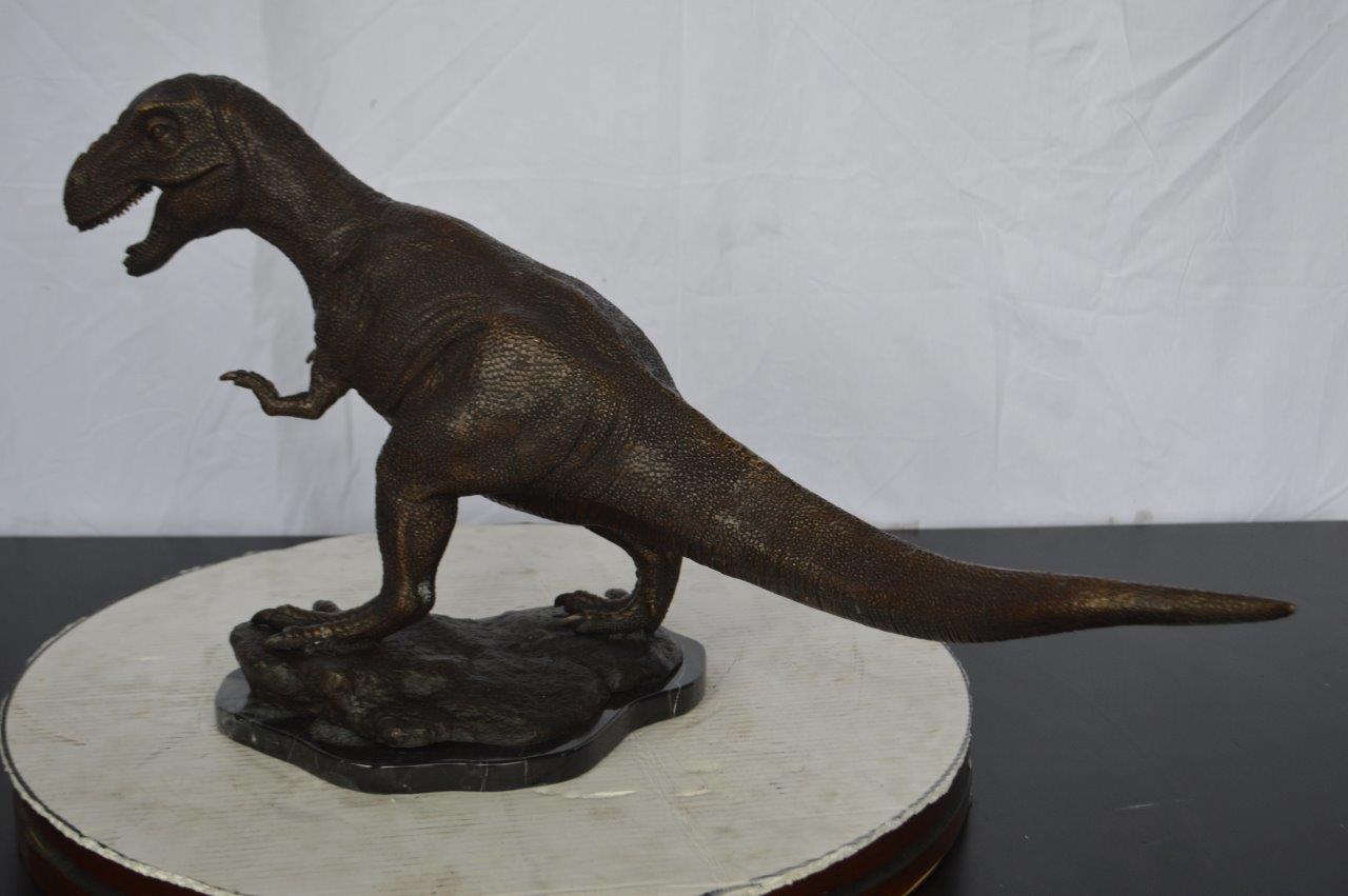 Tyrannosaurus Rex Dinosaur Bronze Statue -  Size: 31"L x 12"W x 15"H.