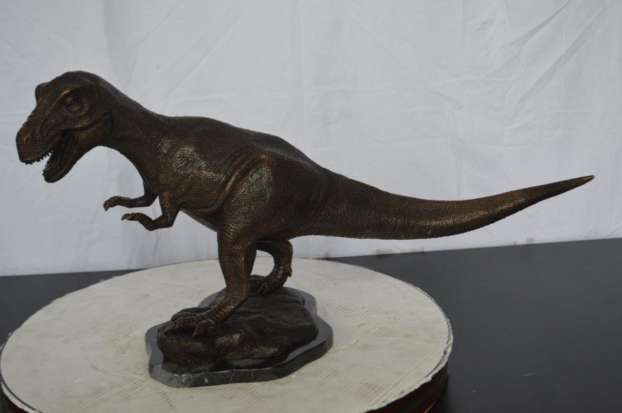 Tyrannosaurus Rex Dinosaur Bronze Statue -  Size: 31"L x 12"W x 15"H.