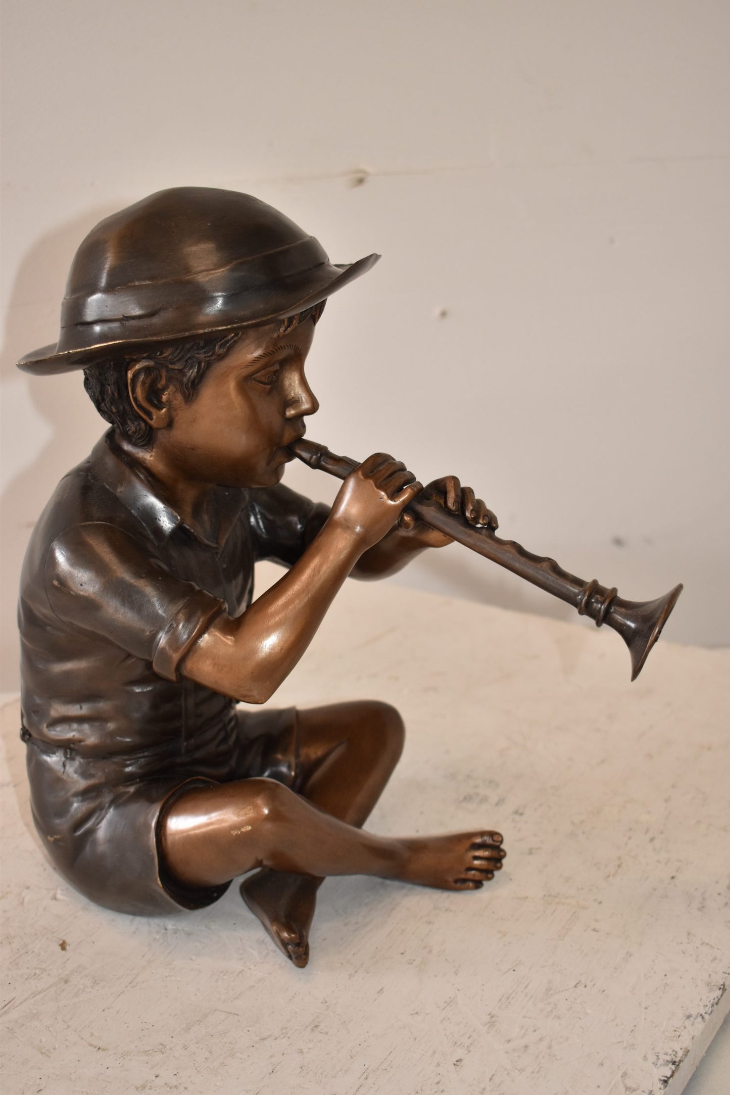 A little Boy Playing his Flute Bronze Fountain Size: 13" x 8" x 15"H