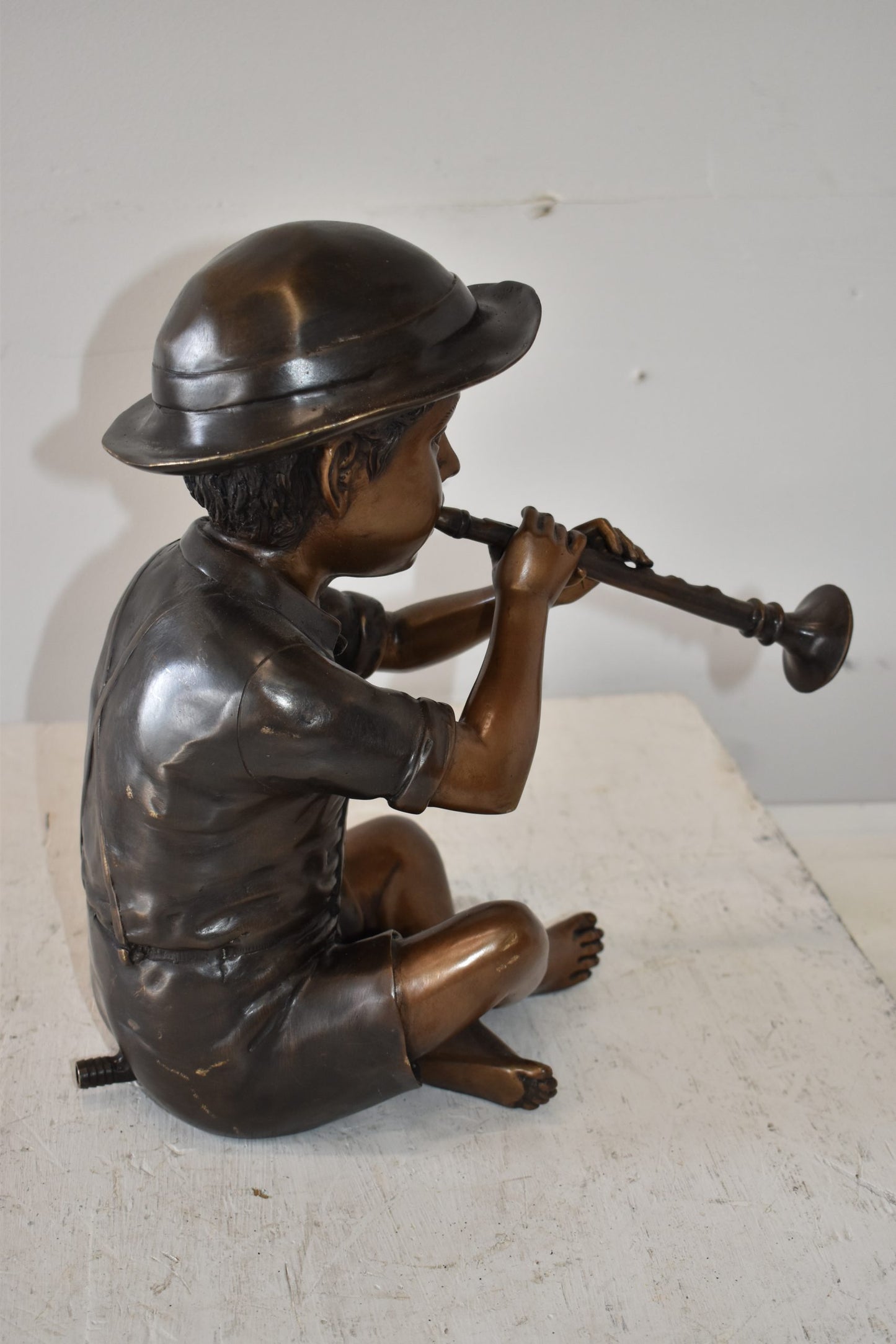 A little Boy Playing his Flute Bronze Fountain Size: 13" x 8" x 15"H