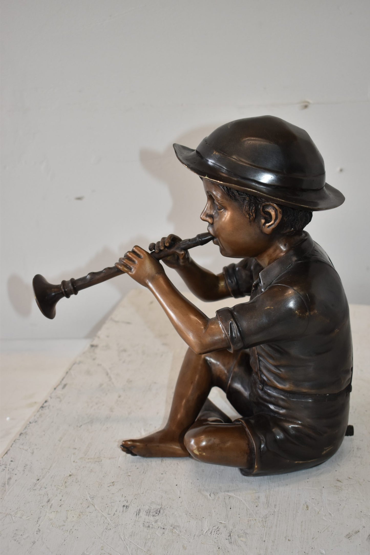 A little Boy Playing his Flute Bronze Fountain Size: 13" x 8" x 15"H