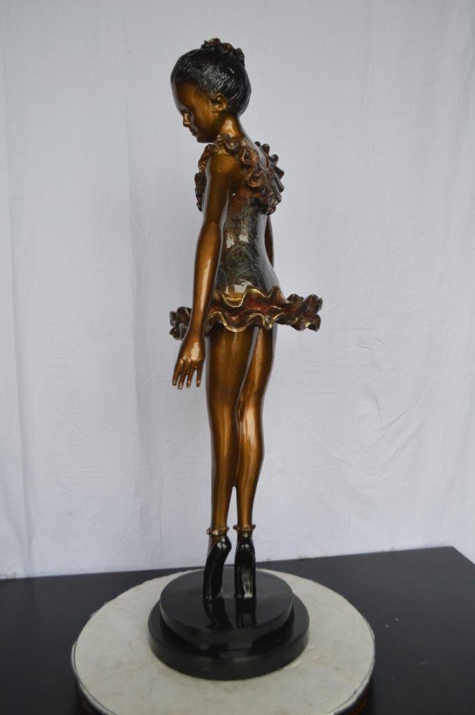 Ballet Dancer on Tippy Toes Bronze Statue -  Size: 25"L x 14"W x 47"H.