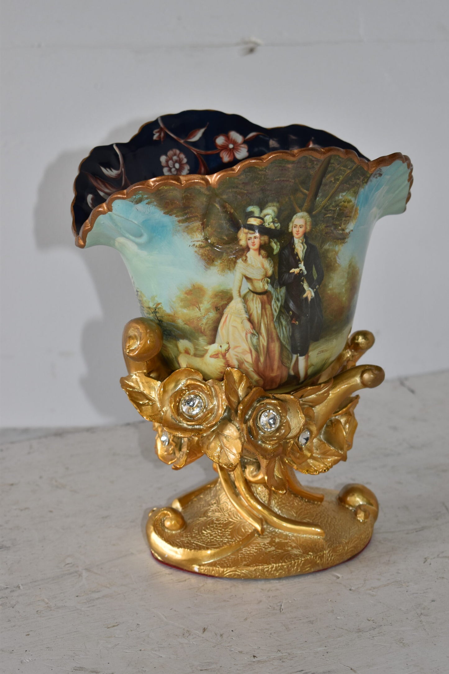 Blossoming Resin Vase with Mr. William Hallett Design Size: 9" x 8" x 12"H