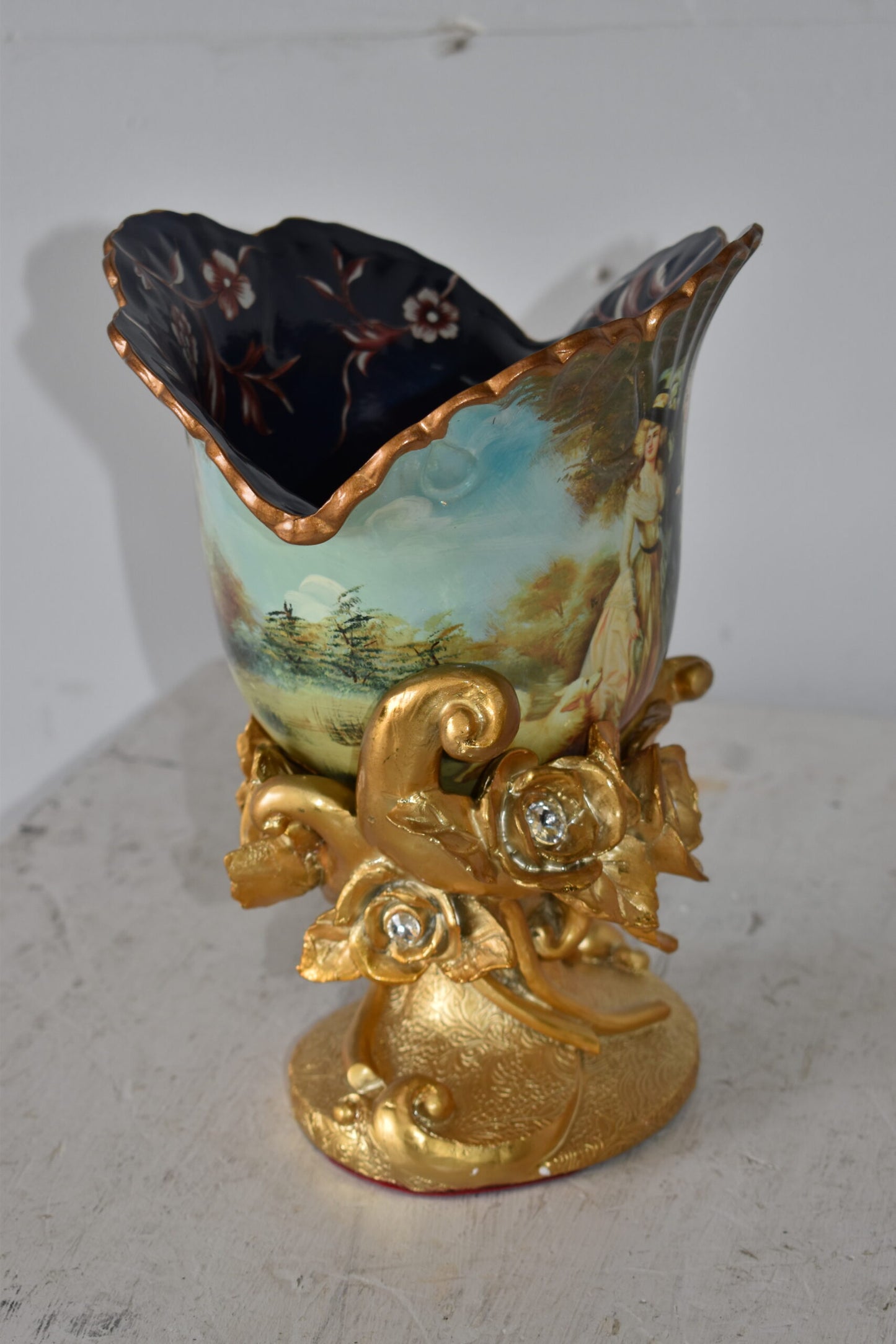 Blossoming Resin Vase with Mr. William Hallett Design Size: 9" x 8" x 12"H