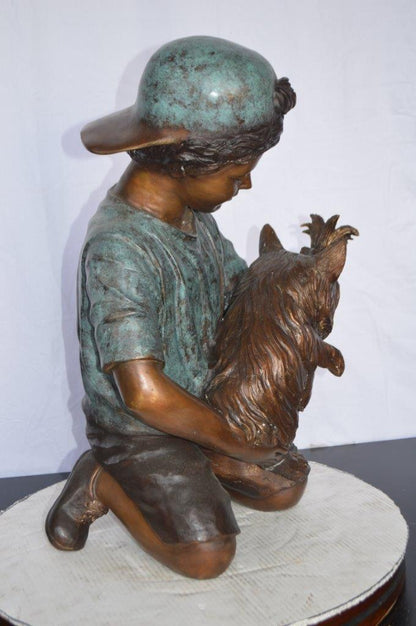 Young Child Playing With His Dog Bronze Statue -  Size: 18"L x 17"W x 26"H.