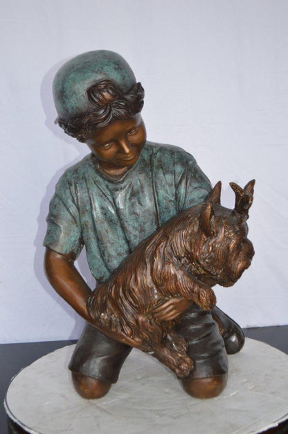 Young Child Playing With His Dog Bronze Statue -  Size: 18"L x 17"W x 26"H.