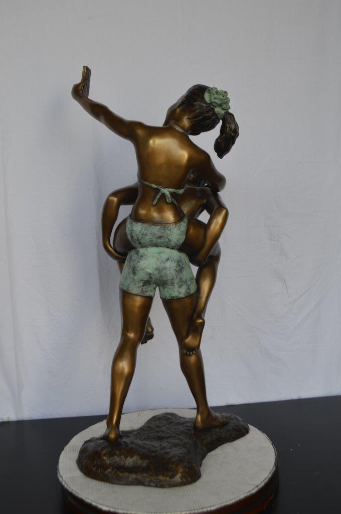 Kids Taking a Selfie W a Smartphone Bronze Statue -  Size: 23"L x 20"W x 43"H.