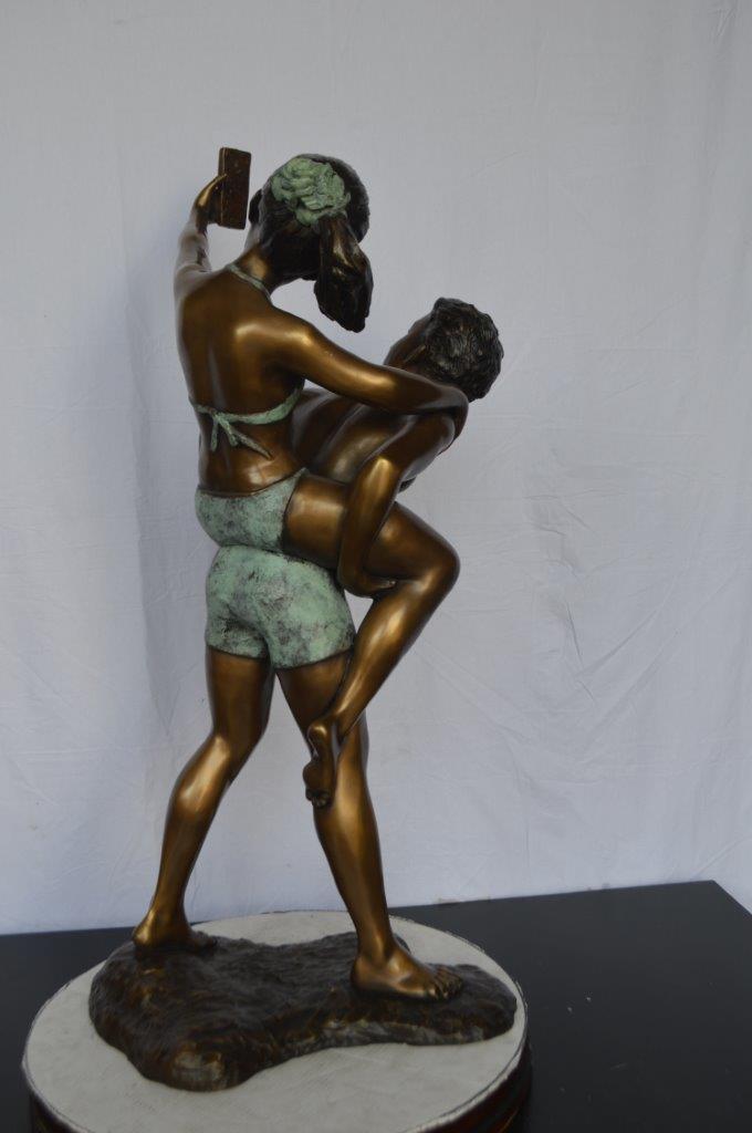 Kids Taking a Selfie W a Smartphone Bronze Statue -  Size: 23"L x 20"W x 43"H.