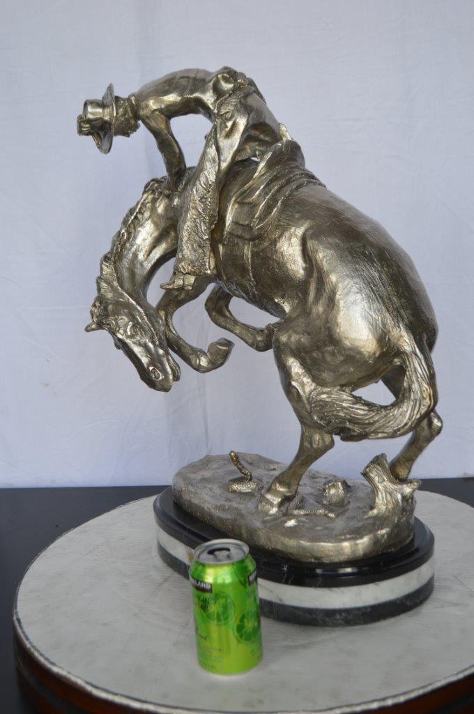 Remington Rattlesnake silver finish Bronze Statue -  Size: 17"L x 11"W x 23"H.