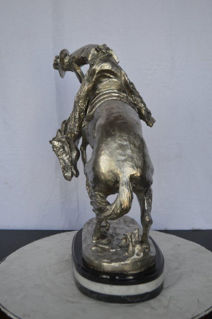 Remington Rattlesnake silver finish Bronze Statue -  Size: 17"L x 11"W x 23"H.