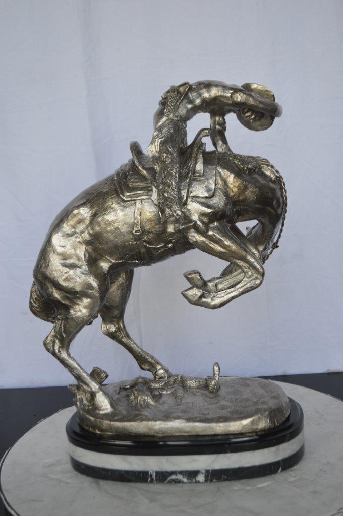 Remington Rattlesnake silver finish Bronze Statue -  Size: 17"L x 11"W x 23"H.