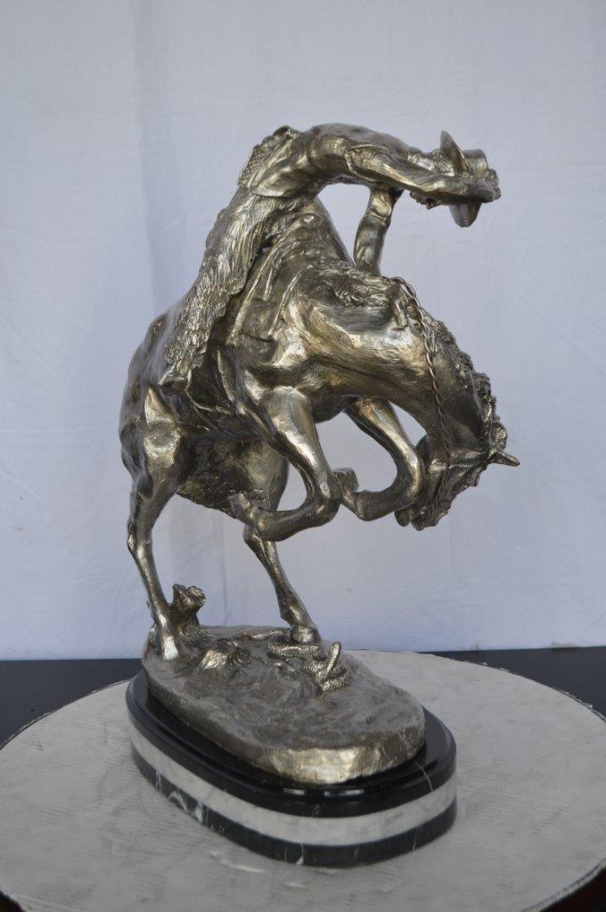 Remington Rattlesnake silver finish Bronze Statue -  Size: 17"L x 11"W x 23"H.