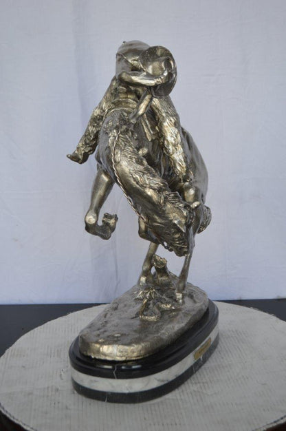 Remington Rattlesnake silver finish Bronze Statue -  Size: 17"L x 11"W x 23"H.