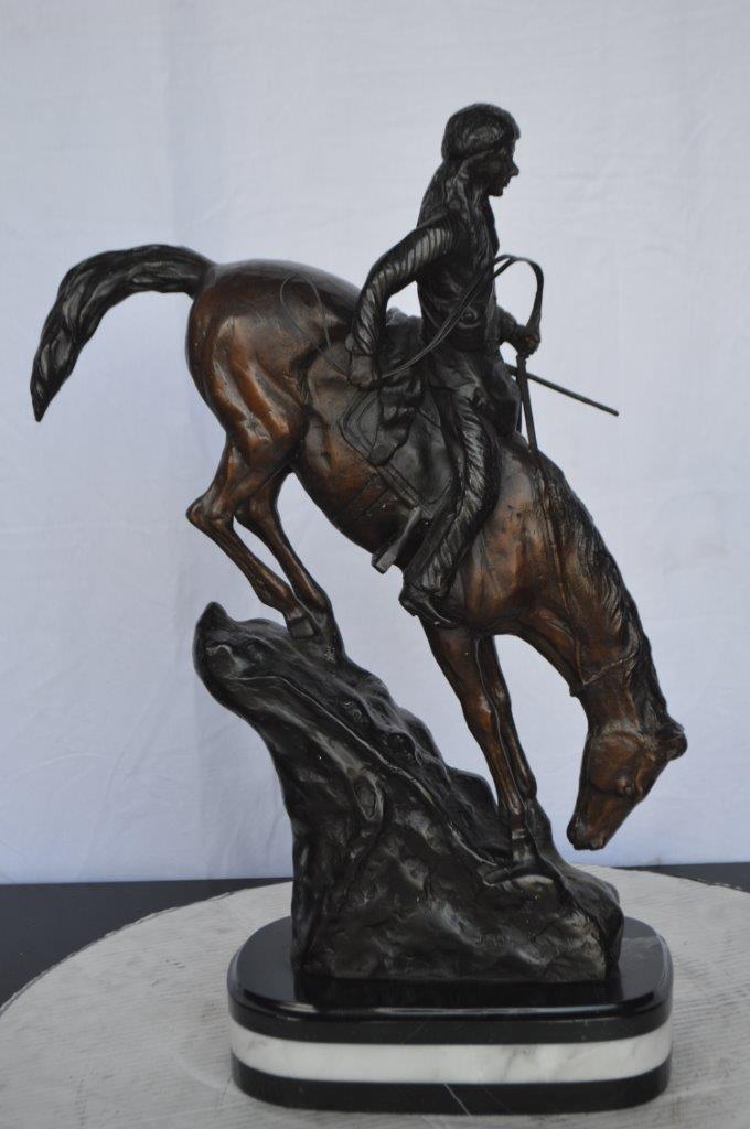 Mountain Man replica by Frederic Remington -  Size: 6"L x 14"W x 22"H.