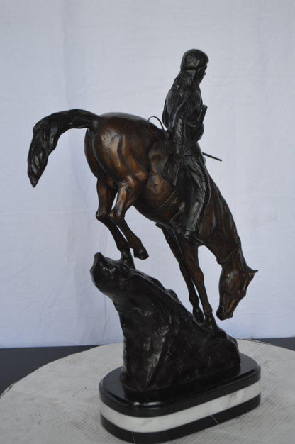 Mountain Man replica by Frederic Remington -  Size: 6"L x 14"W x 22"H.