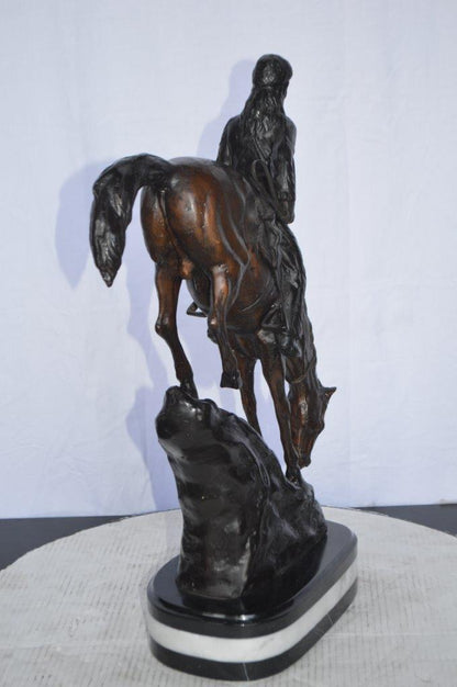 Mountain Man replica by Frederic Remington -  Size: 6"L x 14"W x 22"H.