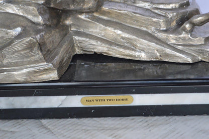 Man with two horses silver finish Bronze Statue -  Size: 25"L x 13"W x 26"H.