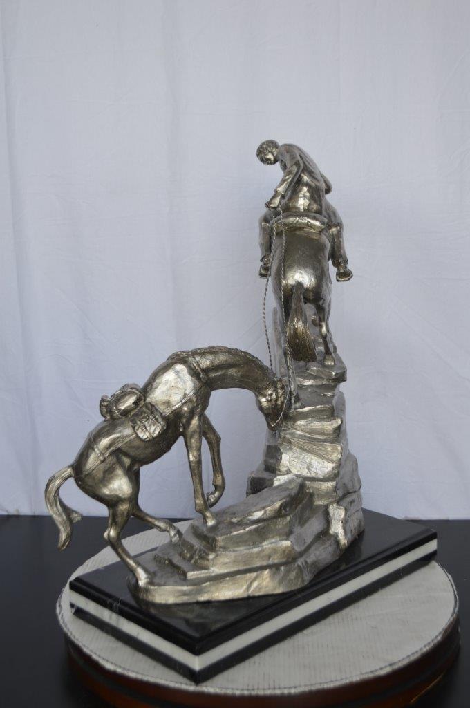 Man with two horses silver finish Bronze Statue -  Size: 25"L x 13"W x 26"H.