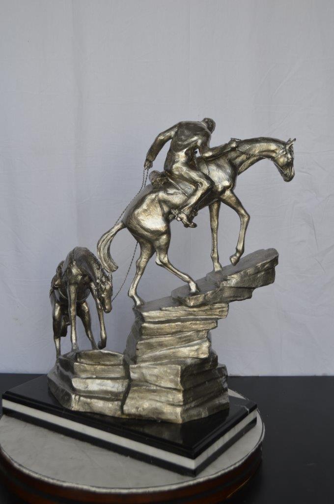 Man with two horses silver finish Bronze Statue -  Size: 25"L x 13"W x 26"H.