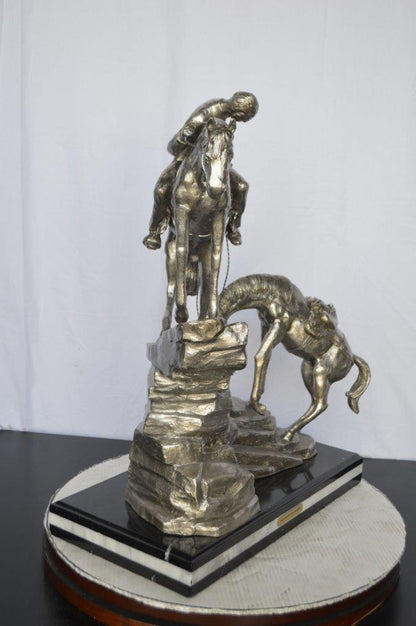 Man with two horses silver finish Bronze Statue -  Size: 25"L x 13"W x 26"H.