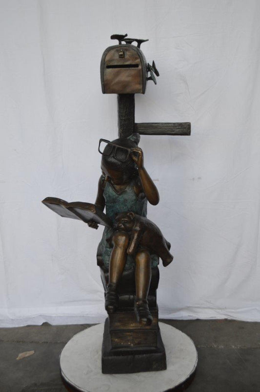 Mailbox - Girl sitting on books and reading -  Size: 26"L x 22"W x 53"H.