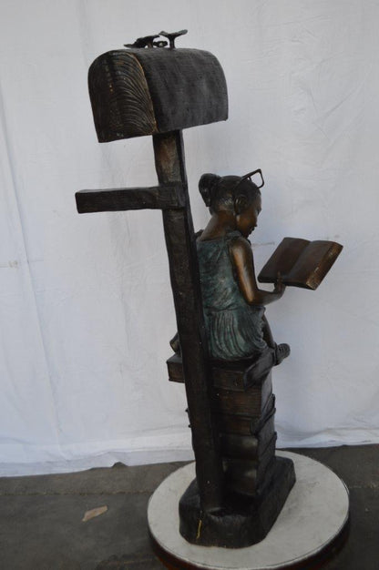 Mailbox - Girl sitting on books and reading -  Size: 26"L x 22"W x 53"H.