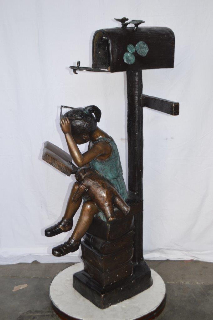 Mailbox - Girl sitting on books and reading -  Size: 26"L x 22"W x 53"H.