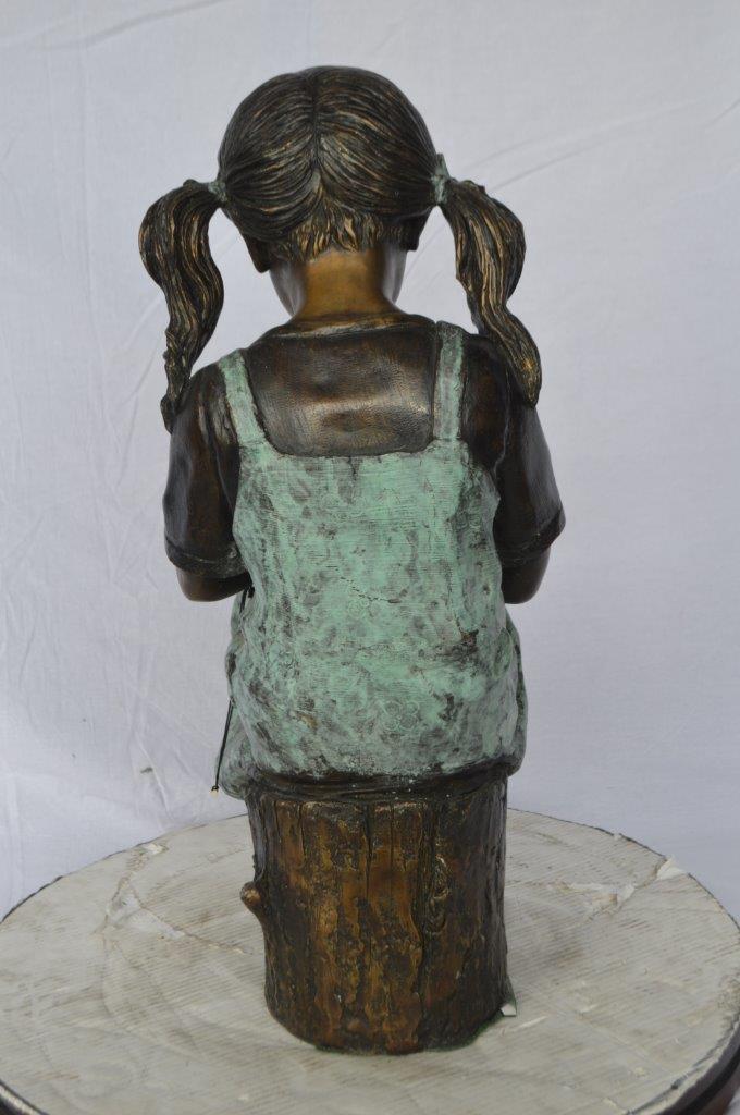 Girl with birthday cake bronze statue -  Size: 13"L x 10"W x 27"H.