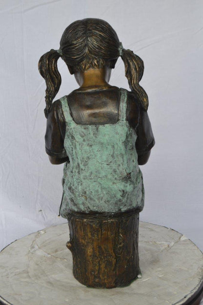 Girl with birthday cake bronze statue -  Size: 13"L x 10"W x 27"H.