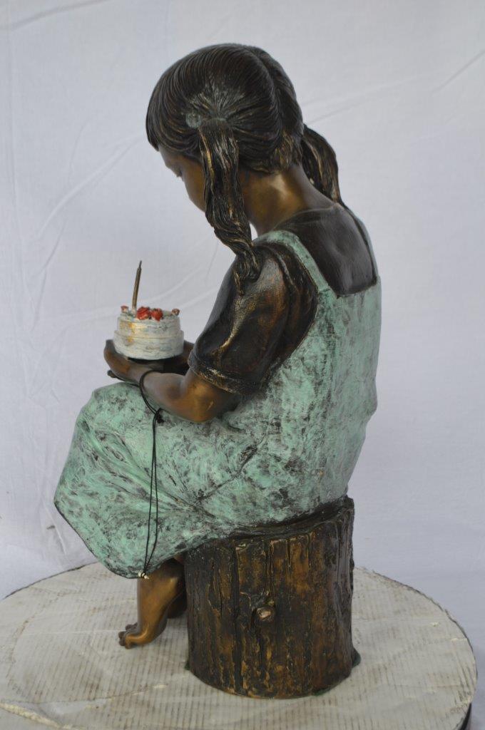 Girl with birthday cake bronze statue -  Size: 13"L x 10"W x 27"H.