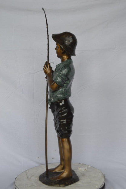 Boy with fishing rod  bronze statue -  Size: 11"L x 14"W x 44"H.