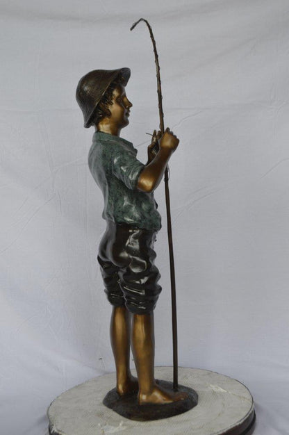 Boy with fishing rod  bronze statue -  Size: 11"L x 14"W x 44"H.