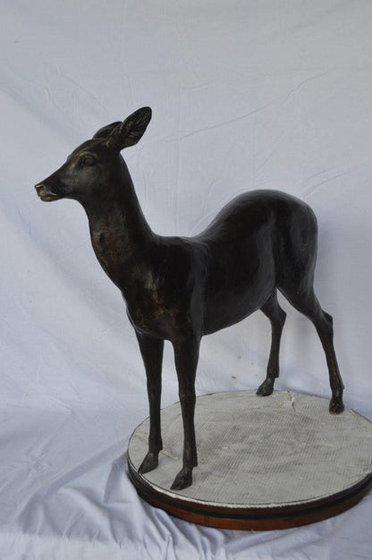 Doe - baby deer bronze statue -  Size: 30"L x 8"W x 30"H.